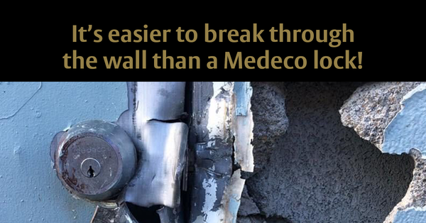 It's easier to break through the wall than a Medeco lock!